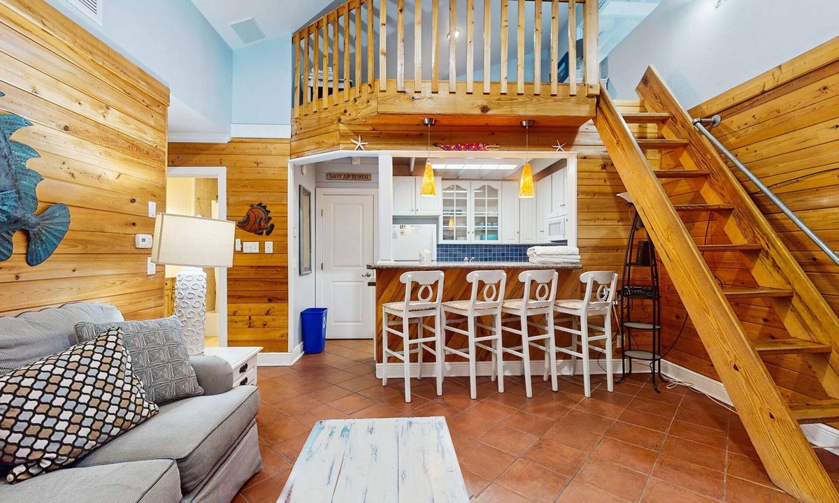 St. George Island Condo | Cozy coastal condo with loft, shared pool and beach access