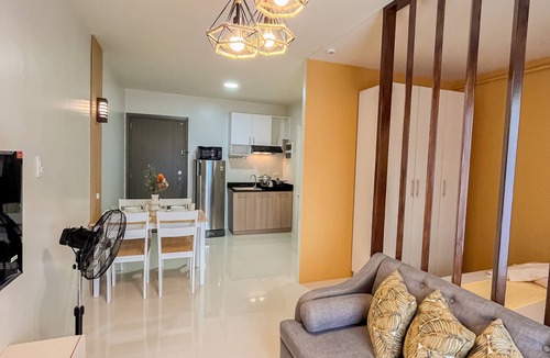 Puerto Princesa City Centre Apartment | Chic Ruby Studio: Balcony, Private Pool, Gym Access