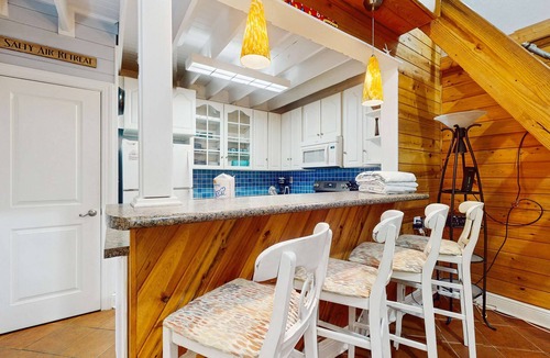 St. George Island Condo | Cozy coastal condo with loft, shared pool and beach access