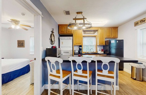 St. George Island Condo | Cozy coastal condo with shared pool, washer/dryer,and beach access