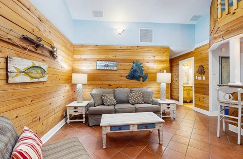 St. George Island House | Cozy coastal condo with loft shared pool and beach access