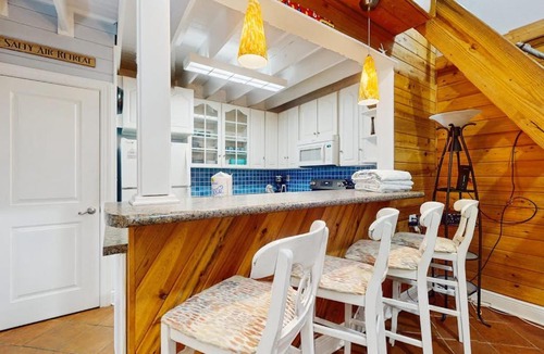 St. George Island House | Cozy coastal condo with loft shared pool and beach access