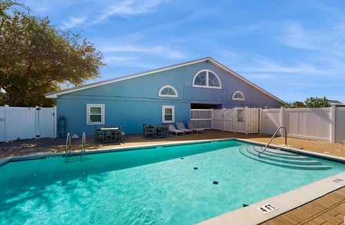 St. George Island House | Cozy coastal condo with loft shared pool and beach access