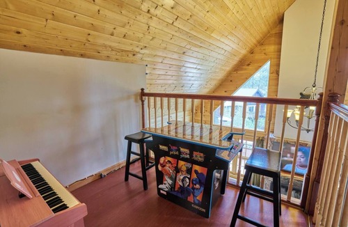 Whispering Forest Cabin | Modern Rustic Escape, Relaxing Deck with Firepit Table - No Better Escape than Our Private Lot - 3BR w/Game Loft, Pac Man tabletop games console!