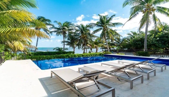 Beachfront Villa with Long Private Pier and Pool! in Ambergris Caye