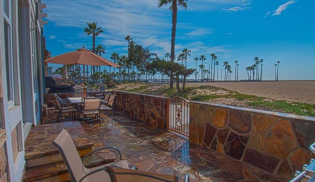 Breathtaking, unique & highly upgraded lower unit right on the Balboa Boardwalk! in Newport Beach