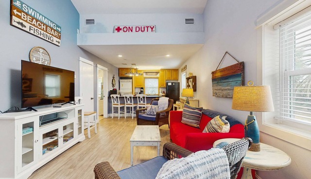 Cozy coastal condo with shared pool, washer/dryer,and beach access