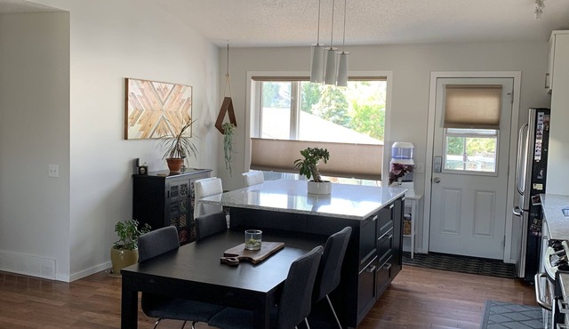Dog friendly home that is perfectly situated between the mountains and the city. in Cochrane