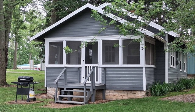 Newland's Resort Hill Cottage #3 on Indian Lake with a boat dock in Lakeview