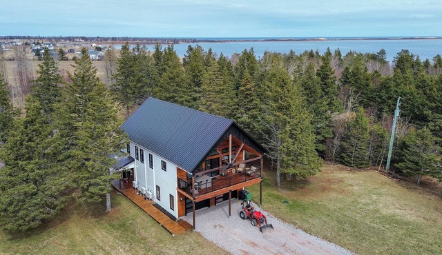 Peaceful Brackley Beach Escape with Private Deck, Fire Pit & Paddleboards in Prince Edward Island