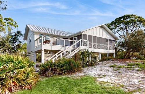 Plantation House | Charming cottage walk to Gulf with shared pools hot tub & central AC