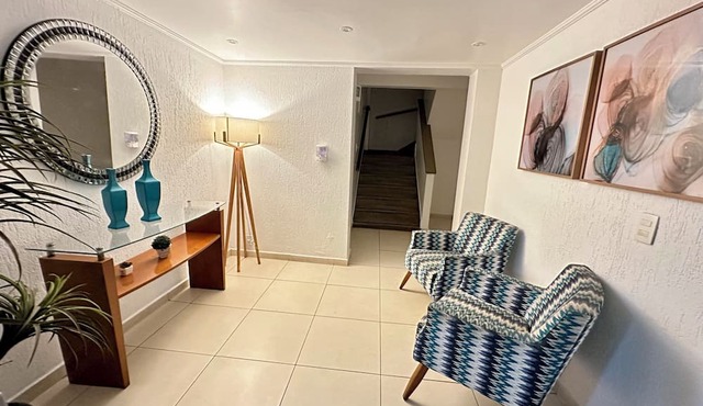 Apartment with 3 bedrooms, one with a balcony, spacious and comfortable living room! in Cabo Frio