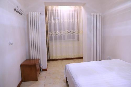 Yabuli Qingyun County Xin Ding Apartment Hotel in Shangzhi